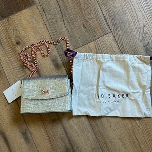 TED BAKER silver cross body with rose gold accents